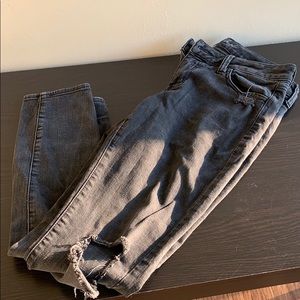 Washed black ripped American Eagle skinny jeans
